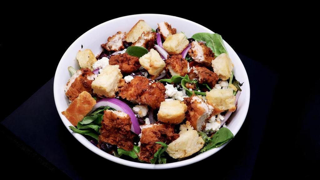 Uptown Salad · spring mix, red onion, red cabbage, crispy bacon, bleu cheese crumbles, pecans, dried cranberries, biscuit croutons, house-made balsamic vinaigrette