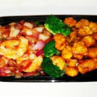Dragon And Phoenix · General Tso's chicken and shrimp with chili sauce. Hot and spicy.