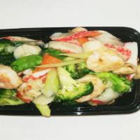 Seafood Delight · King crab meat, lobster, jumbo shrimp,  delicately sauteed with assorted vegetable.