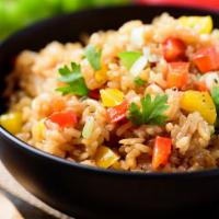 Vegan Fried Rice · Fried Rice featuring fried tofu, green and white onions, fresh bell peppers, peas, carrots, ...