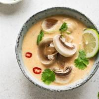 Tom Kha Soup · Delicate coconut milk soup. Lightly sweet and sour with the aroma of galangal root, lemongra...
