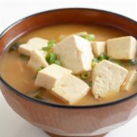 Tofu Soup · Fresh tofu, mushrooms, baby corns, chopped carrots, and water chestnuts in hot broth, garnis...