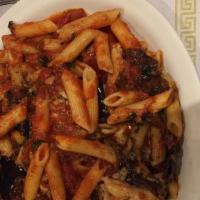 Pollo Con Pasta · Choice of penne, spaghetti, or linguini pasta with grilled chunks of marinated chicken breas...
