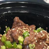 Beef Teriyaki Bowl · Beef simmered in home made teriyaki sauce served with rice and stir fried veggies