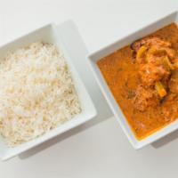 Chicken Tikka Masala · Boneless chicken marinated and cooked in tandoor and sautéed with tomato/onion creamy based ...