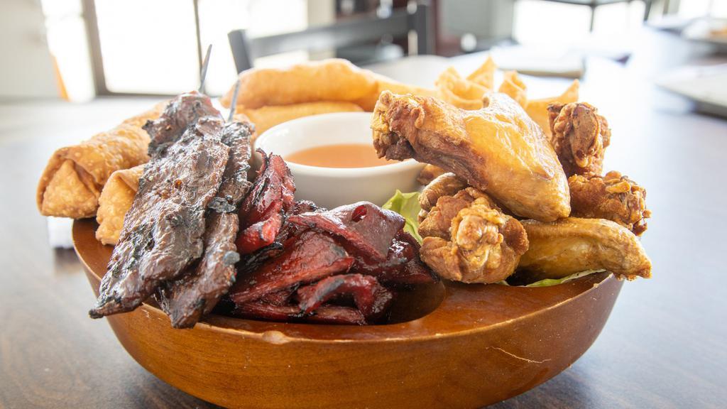 Pu Pu Platter (For 2) · Egg rolls, chicken tenders, crab rangoons, chicken wings, beef sticks and boneless spare ribs.
