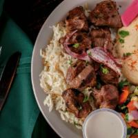 Lamb Kabob · Customer favorite. Two skewers of grilled marinated Iamb of the highest quality.