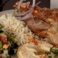 Lamb Shank · Customer favorite. Hearty portions arrive on the bone.
Served on a bed of Middle-Eastern ric...