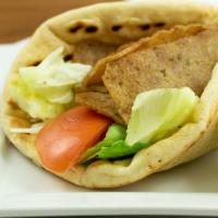 Gyros Chicken Or (Beef & Lamb) · Dairy free. Hand-carved gyro meat with seasoning on grilled pita bread, with lettuce, tomato...