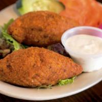 Kibbeh (2 Pieces) · Contain nuts. Little meatballs of lamb and bulgur wheat stuffed and minced lamb, onion and a...