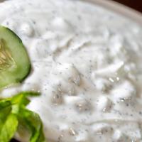Cucumber Dill Yogurt · Vegetarian and gluten-free (when ordered without pita). Yogurt mixed with cucumber, mint, an...