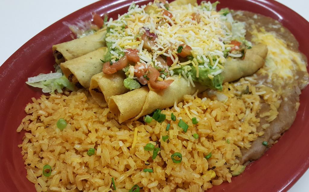 Flautas De Pollo (3) · Seasoned chicken filled inside corn tortillas and lightly fried, topped with guacamole, pico de gallo, and cheese. served with refried beans and rice.