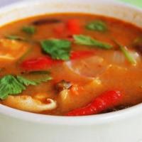 Red Curry · Bamboo, bell peppers, thai basil in coconut milk and red curry paste.