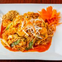 Pad Thai · Rice noodles stirred fried with eggs, bean sprouts, yellow onions, green onions, and cabbage...