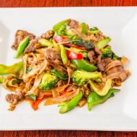 Pad Kee Mow (Drunken Noodles) · Flat noodles with basil, eggs, Chinese broccoli, broccoli, mushroom, bell peppers and bok ch...