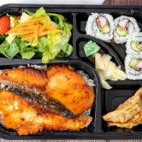 Salmon Teriyaki Bento Box · Served with four pieces of California roll, garden salad, rice, and fried dumplings.
