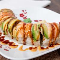 Tiger Roll · Shrimp tempura inside with avocado and steam shrimps on top. Drizzled on top with eel sauce ...