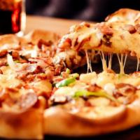 Surf & Turf Pizza · Fresh, square thin crispy crust pizza with our spicy sauce, marinated jumbo shrimp, marinate...