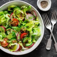 Garden Salad · Fresh garden salad recipe combines fresh crunchy veggies and greens with croutons and shredd...