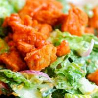 Buffalo Chicken Salad · Fresh garden salad recipe combines marinated breaded chicken tender, organic crispy green mi...