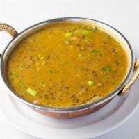 Daal Makhani · Lentils flavored with freshly ground spices and sauteed in butter.