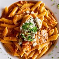 Penne Black & Blue · Penne tossed in a vodka sauce with blackened chicken and bleu cheese crumbles.