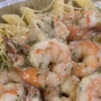 Shrimp Scampi · Half pound of extra large shrimp, scampi sauce, over penne pasta. Served with garlic bread.