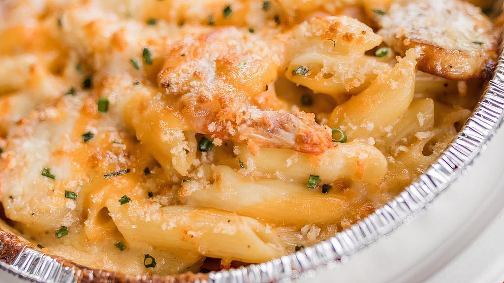 Seafood Mac & Cheese · Crab, shrimp and penne pasta in a cheesy cream sauce. Served with garlic bread.