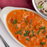 Chicken Tikka Masala · Boneless cubes of chicken grilled in tadoor and cooked in a rich creamy tomato and onion sau...