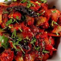 Chilli Chicken · Batter-fried chicken cooked with onions and bell peppers in a blend of Special Indo-Chinese ...