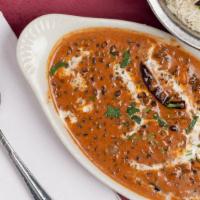 Dal Makhani-Black Lentils · Simmered lentils and red kidney beans sauteed with tomatoes, ginger, cumin, onions and garlic.