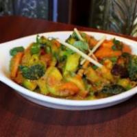 Mix Vegetable Curry · Vegetables cooked with traditional onion based curry sauce.
