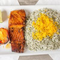 Broiled Salmon · Marinated flavorful salmon broiled in olive oil and served with
basmati dill rice.