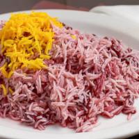 Zereshk Polo · Basmati rice mixed with red sweet and sour barberries.