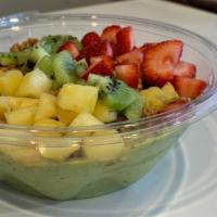 Shrek Bowl 24 Oz · Green base topped with kiwi, pineapple, strawberry, chia seeds granola and honey.