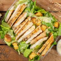 Caesar Salad · Fresh romaine and Parmesan served with homemade garlic croutons and served with Caesar dress...