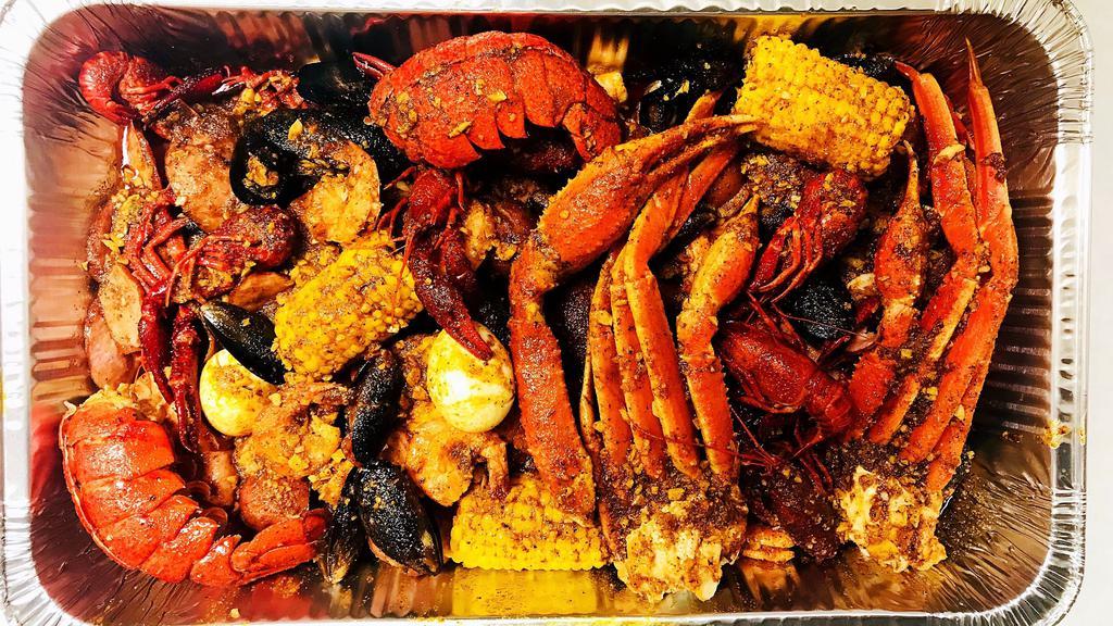 Seafood Combo #1 · 1/2 LbSnow Crab Legs ,1/2 LbShrimp (Head Off),1/2 Lb Crawfish, 1/2Lb Black Mussel ,2 Corns and 2 Potatoes