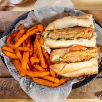 Fried Witing Fish Sandwich  · w/ Choice of Cajun Fries, French Fries or Sweet Potato Fries
w. Lettuce, Tomato, Homemade Sa...