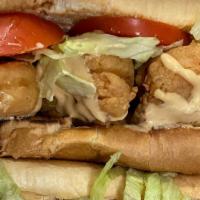Fried Shrimp Sandwich  · w/ Choice of Cajun Fries, French Fries or Sweet Potato Fries
w. Lettuce, Tomato, Homemade Sa...
