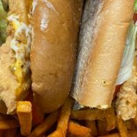 Fried Chicken Tender Sandwich  · w/ Choice of Cajun Fries, French Fries or Sweet Potato Fries
w. Lettuce, Tomato, Homemade Sa...