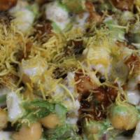Dahi Chaat Papri  · A mouth-watering mixture of crisps, potatoes & chickpeas in tamarind, mint sauce & yogurt