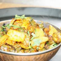 Bhindi Do Piaya  · Okra and onion cooked together with chef's special sauce