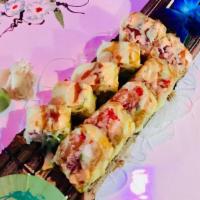 Kiyomi Special Roll · Raw. Tuna salmon yellowtail, avocado mango, cream cheese, tobiko wrapped with soy paper with...