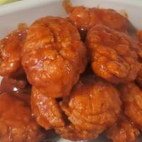 Single Boneless · Breaded and crispy fried boneless wings. Served with your choice of blue cheese or ranch dre...