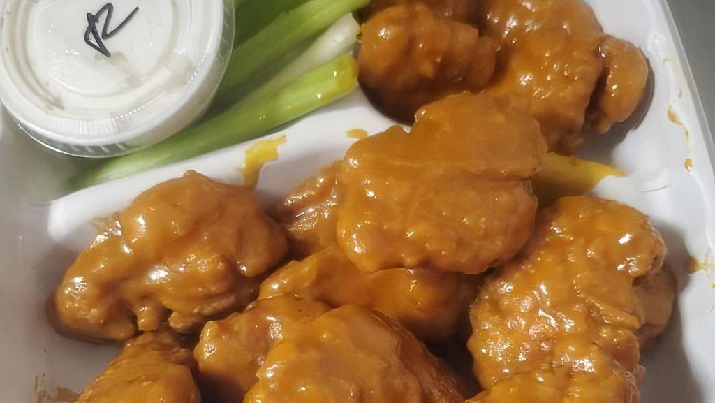 Double Boneless · Breaded and crispy fried boneless wings. Served with your choice of blue cheese or ranch dressing and celery.. Only 1 flavor per order of boneless wings. No splits.