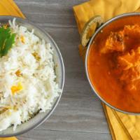 Chicken Tikka Masala · Tender chicken breast grilled in our tandoor oven and simmered in chefs creamy tikka masala ...