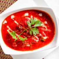 Tikka Masala Chicken · A typical north Indian homestyle preparation of chicken, simmered in onion and creamy tomato...