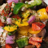 Pepper Steak · Tenderloin cubes, peppers, onions in beef stock over rice (1 side dish).
