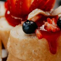 Berry Fritto Cheese Cake · Tortilla wrapped flash-fried homemade cheese cake, glazed fresh berries.