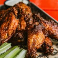 Smoked Chicken Wings - Party Pack (16 Wings) · 16 Wings - Served With Your Choice Of Ranch Or Blue Cheese & Celery Sticks.